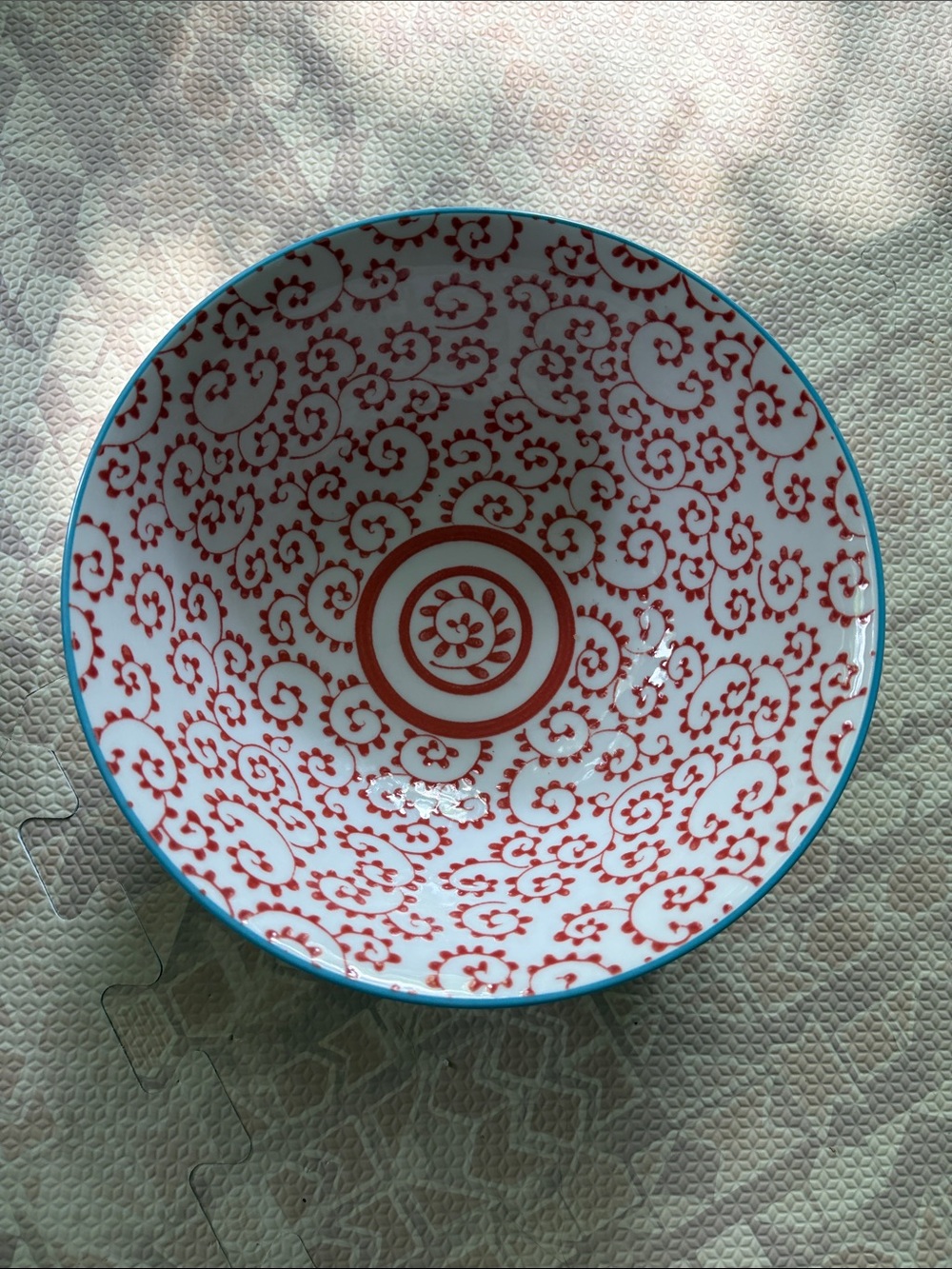 Anthropologie White Ceramic Bowl with Red Floral Motif and Turquoise Rim